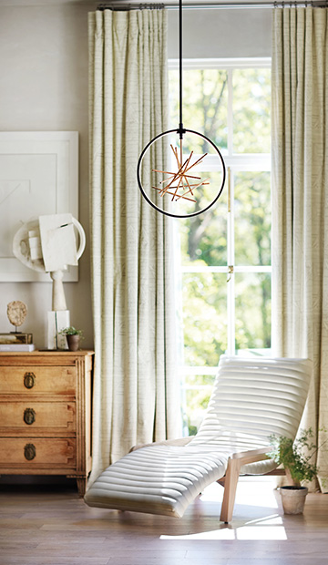 Modern geometric pendant light fixture in bedroom from lighting store