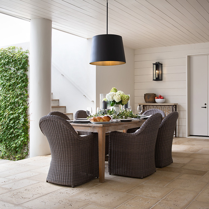 Pendant light above outdoor dining area