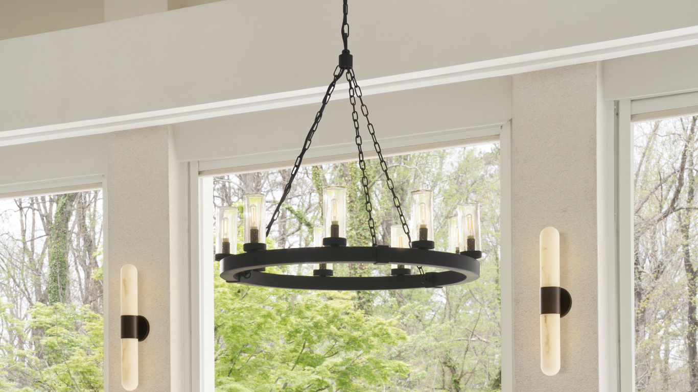 Elegant black chandelier with intricate detailing, complemented by two matching black wall sconces, showcasing a sophisticated lighting arrangement franklin lighting lighting store venice