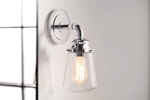 Modern bathroom with a sleek chrome sconce from Franklin Lighting. The sconce’s minimalist design and polished chrome finish add a touch of elegance, providing bright, focused lighting beside the mirror for a clean and contemporary look.