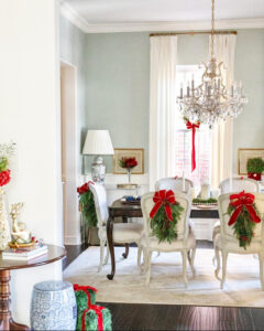 Stunning crystal chandelier from Franklin Lighting elegantly hanging over a dining table, creating a luxurious and inviting ambiance for holiday gatherings.