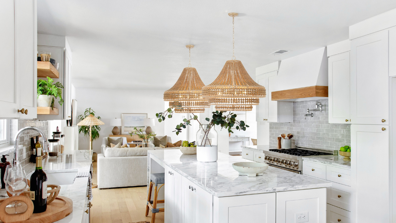 coastal chandelier from franklin lighting hanging in kitchen over island pendants
