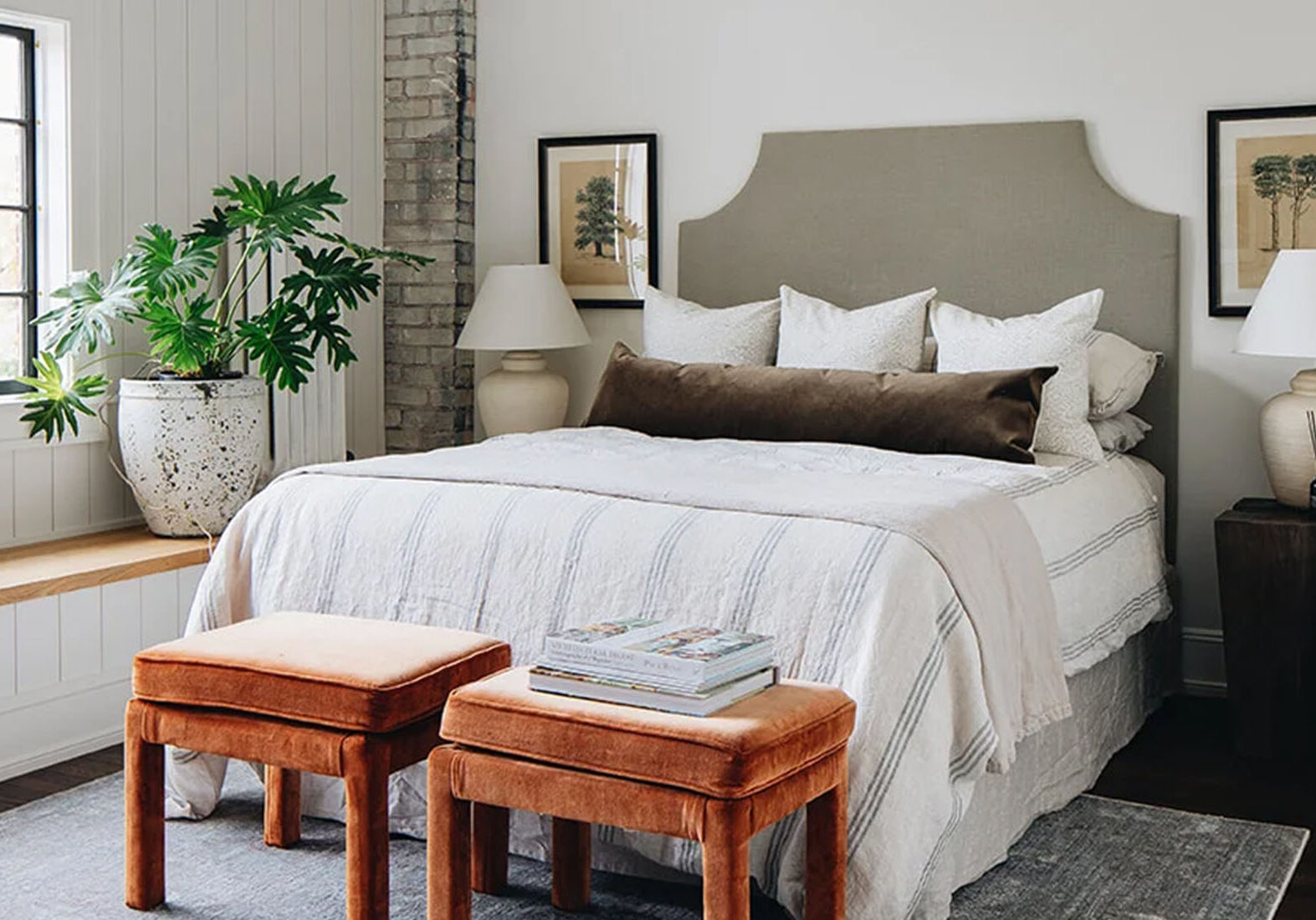 Custom made bedside lamps in a luxury neutral bedroom setting.